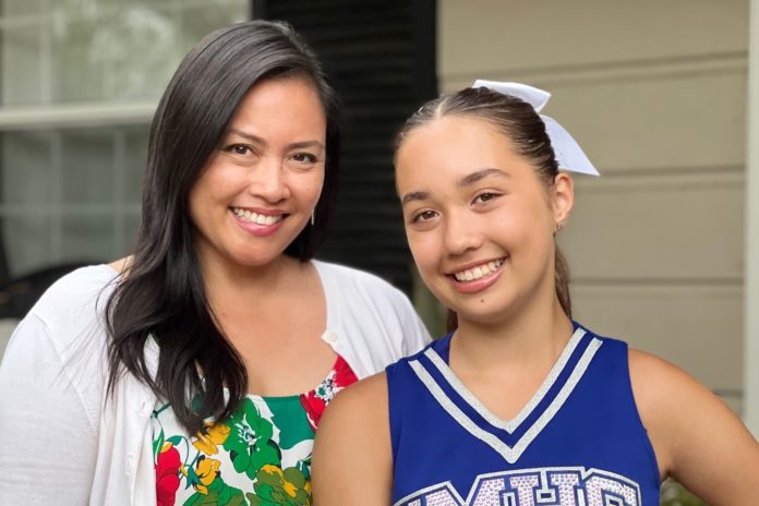 PHOTO: provided by the Freiburg family | Ava Freiburg, right, has followed in her mother Cheryl's footsteps and become a cheerleader at San Marino High School. Cheryl (Cabigas) Freiburg graduated from SMHS in 1997.