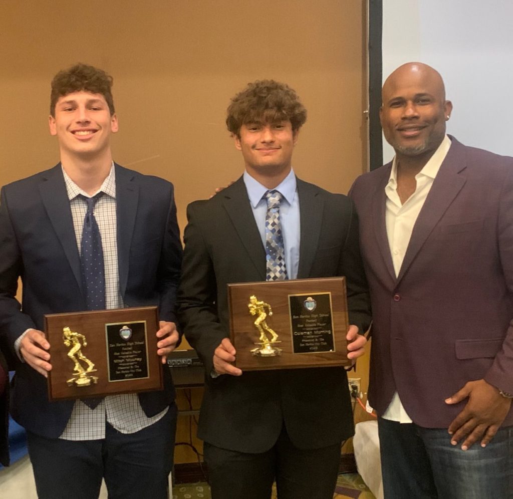PHOTO: Mitch Lehman | San Marino Weekly | Mitchell Mooney and Coleman Morning were named co-most valuable players at the San Marino Football banquet. Pictured here with Coach Nate Turner.