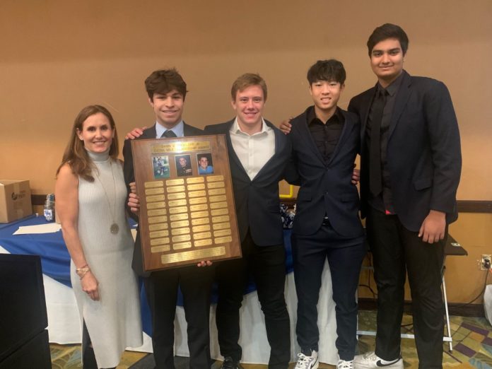 PHOTO: Mitch Lehman | San Marino Weekly | Four Titans were presented with the Dann V. Angeloff Extra Mile Award at the team's banquet on November 29, 2023. The awards were presented by Jenny Singhal, left, in honor of her brother Dann.