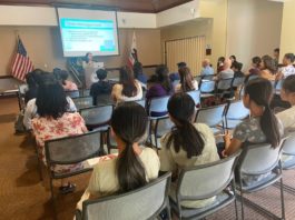 Vanessa Yang with a room-full of attentive attendees